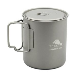 Gray titanium camping mug with a hinged lid and a large rectangular handle; TOAKS 750ml logo on the side.