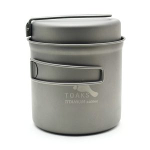 Gray titanium TOAKS camping mug with lid and fold-out side handle, 1100 ml capacity.