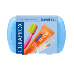 Curaprox Travel Set Modrá 2 Curaprox travel dental care set in a blue case, including toothbrush, toothpaste, and interdental brushes for travel use.
