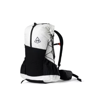 Hiking backpack with a white top section and black bottom, featuring side pockets and bungee cords for gear.