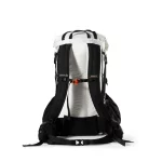 Back view of a black-and-white hiking backpack with padded shoulder straps, a chest strap, and hip belt.