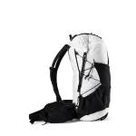 White and black hiking backpack standing upright against a white background, showing external bungee cords and side pocket access.