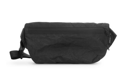 Black waist bag (fanny pack) with a zippered front pocket and adjustable strap, shown from the side.
