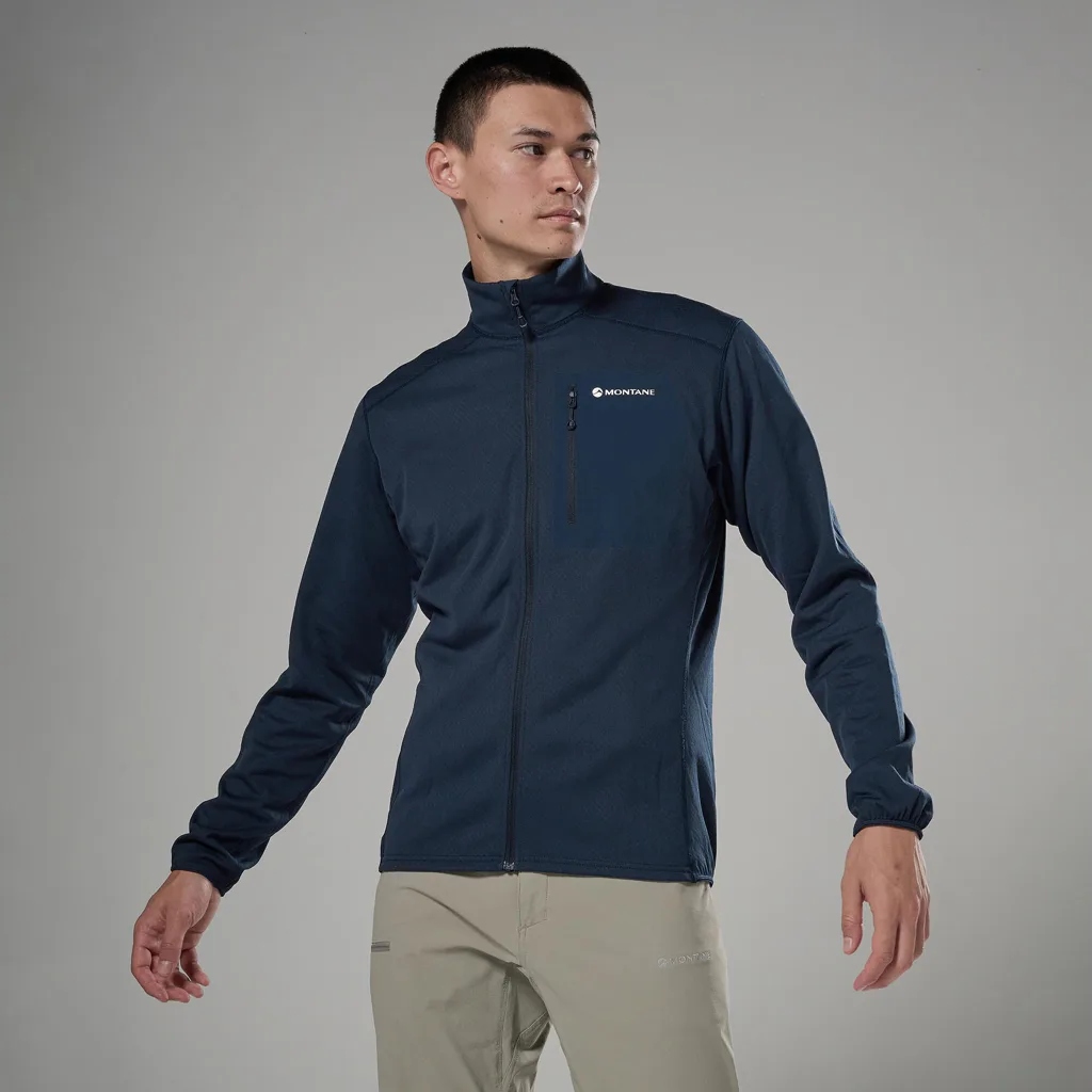 Montane Mens Zepher Jacket Eclipse Blue 02 Man wearing a navy Montane zip-up jacket with high collar, standing against a gray background.