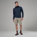 Montane Mens Zepter Hooded Fleece Jacket Eclipse Blue 04 Male model wearing a navy Montane jacket and beige shorts, posing against a gray studio backdrop.