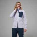 Montane Womens Zepher Hoodie Platinum 02 Woman posing in a light gray Montane jacket with a dark navy chest pocket, looking to the right.
